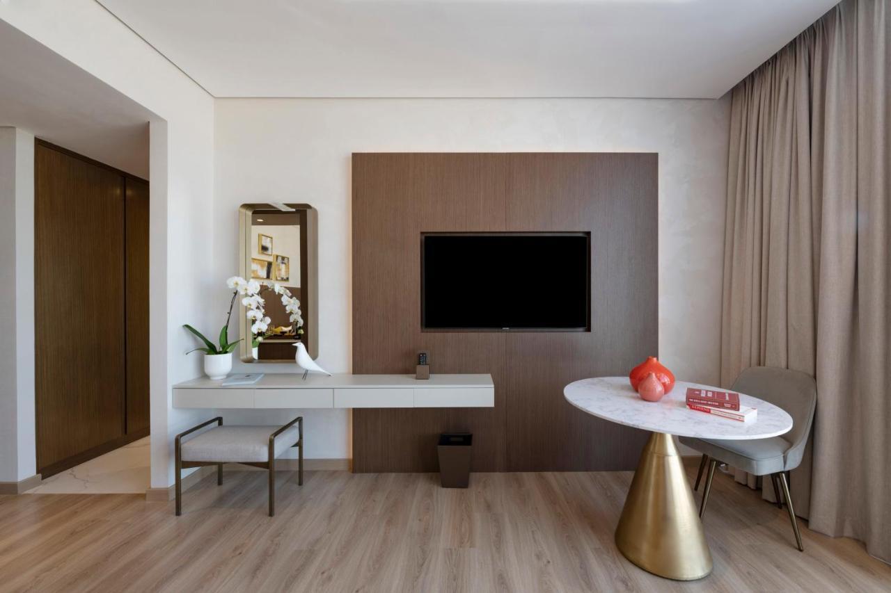 Movenpick Jumeirah Village Triangle Dubaï Extérieur photo A room at the hotel