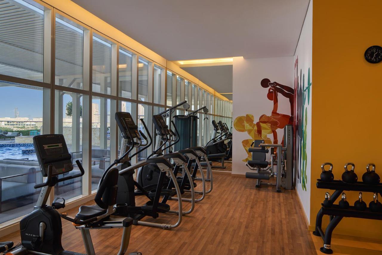 Movenpick Jumeirah Village Triangle Dubaï Extérieur photo The gym at the hotel