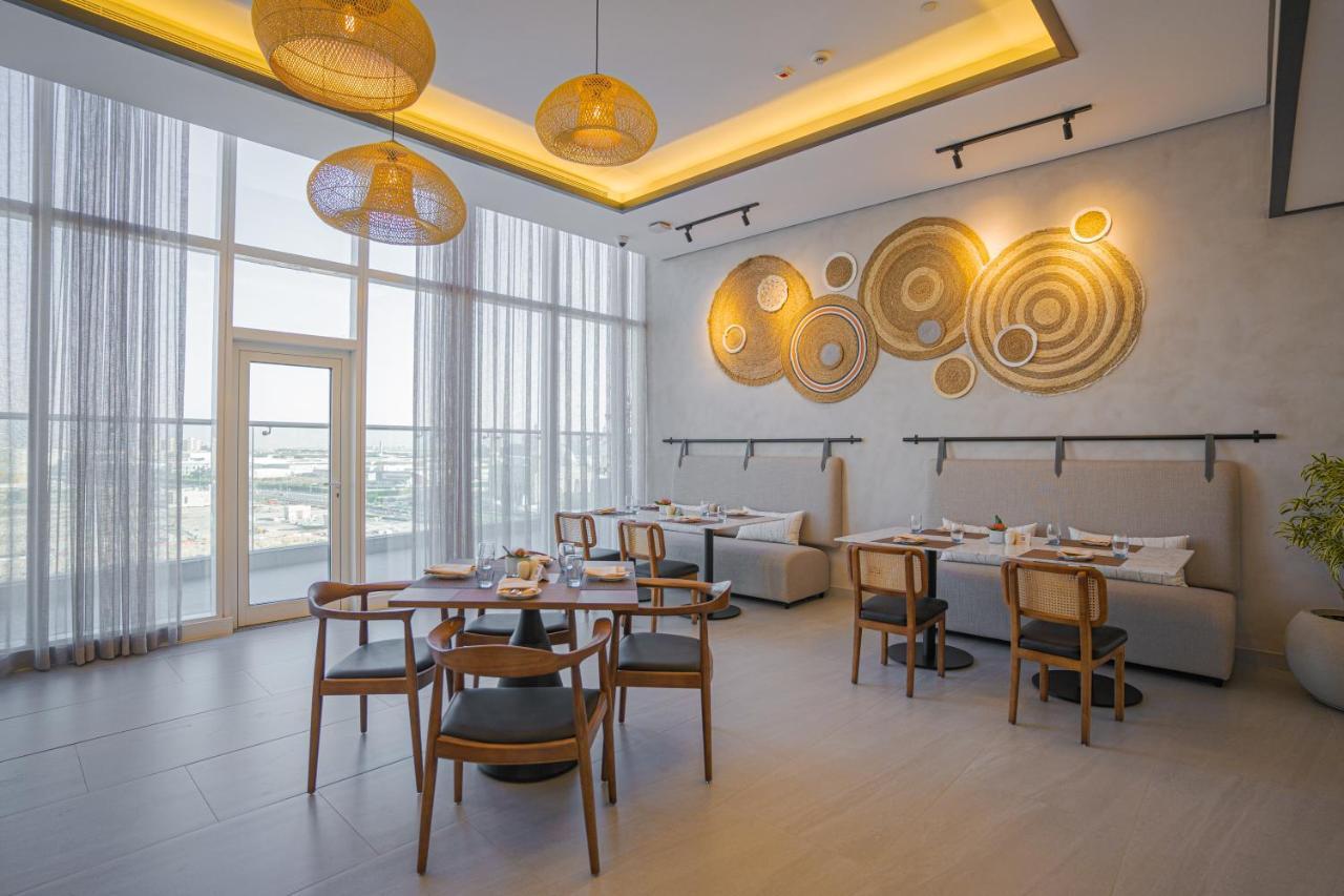 Movenpick Jumeirah Village Triangle Dubaï Extérieur photo The restaurant