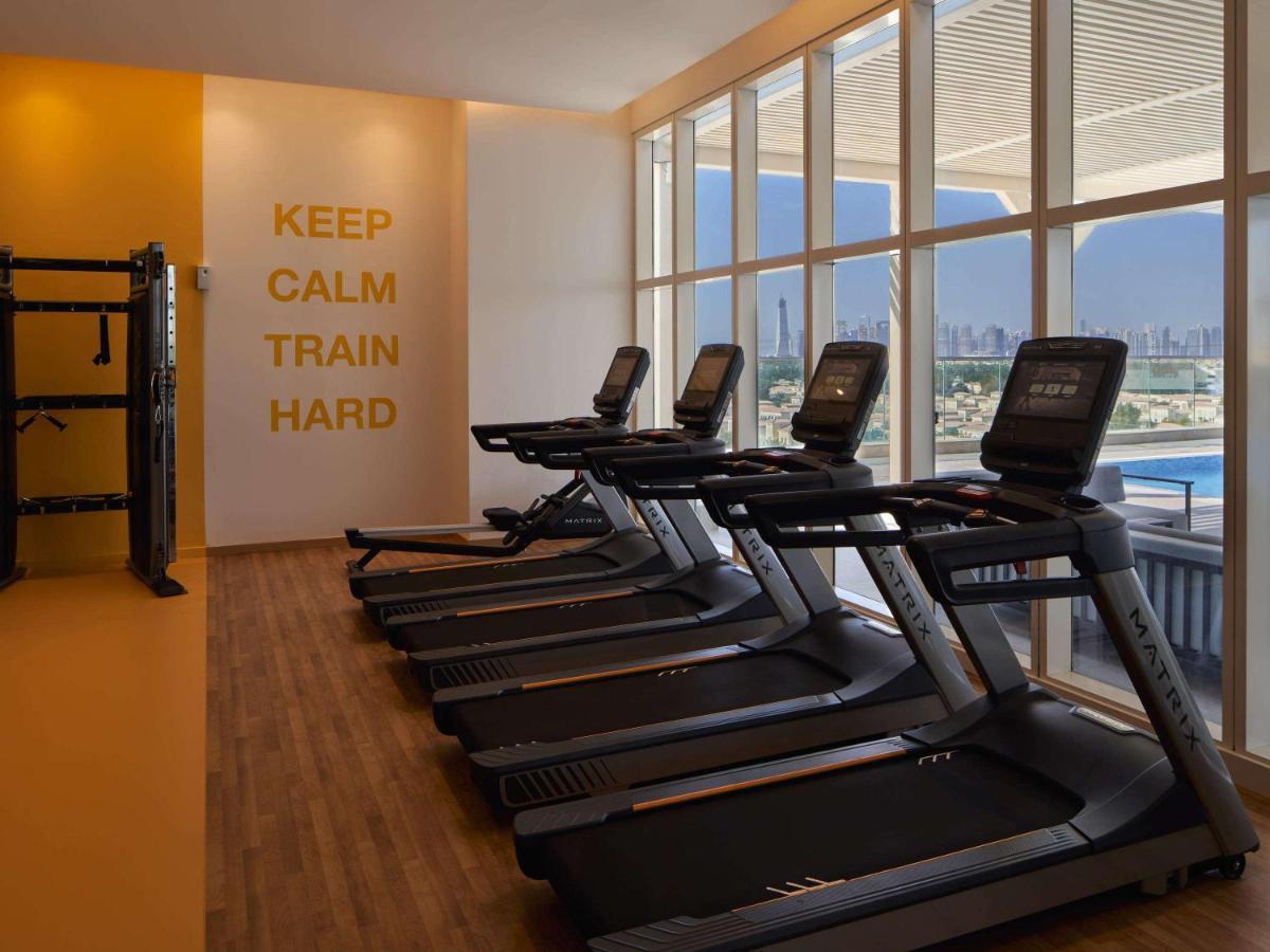 Movenpick Jumeirah Village Triangle Dubaï Extérieur photo The gym at the hotel