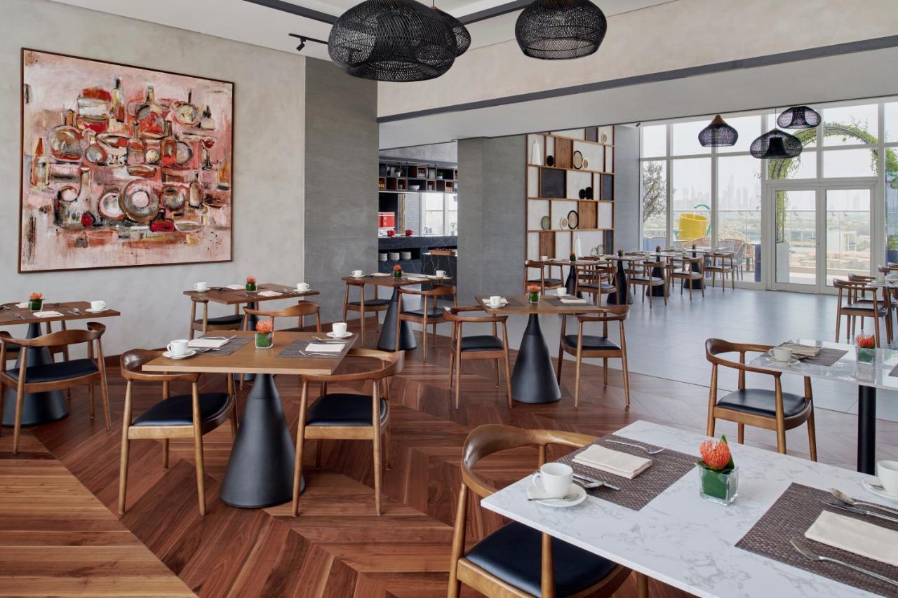 Movenpick Jumeirah Village Triangle Dubaï Extérieur photo The restaurant