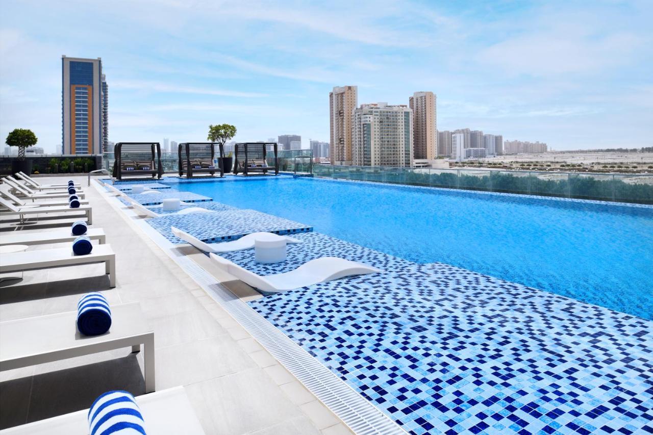 Movenpick Jumeirah Village Triangle Dubaï Extérieur photo Rooftop pool